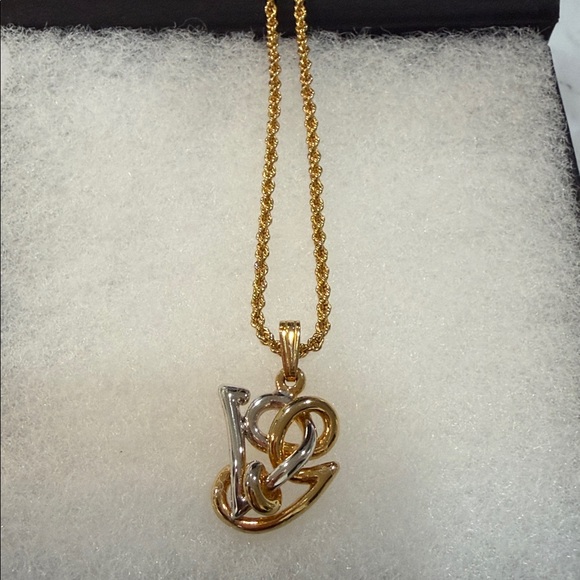 Valentino Garavani Jewelry - Valentino Garavani Gold and Silver Pendant Necklace